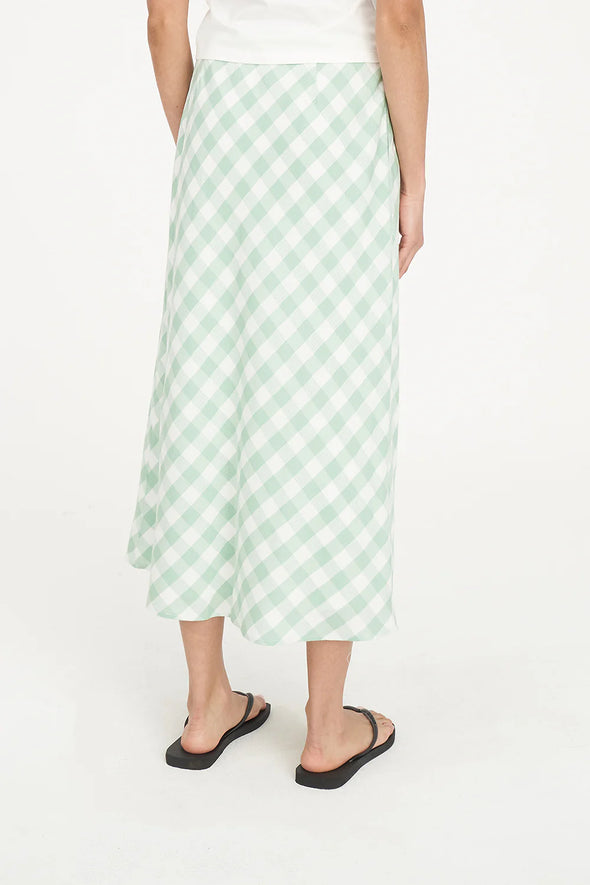 Say hello to effortless style with the Lila Midi Skirt — a refreshing addition to your warm-weather wardrobe. Showcasing the same Matcha green and white diagonal gingham print as the Celine Dress, it’s perfect for coordinating or standing out on its own.