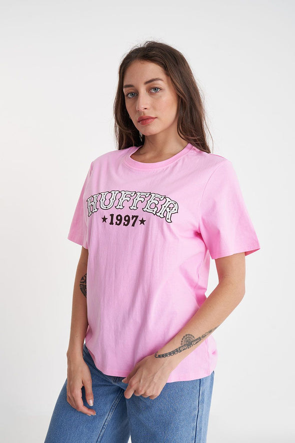 Classic Huffer tee in a pale pink colour. With brand name and est. year in a cowboy font.