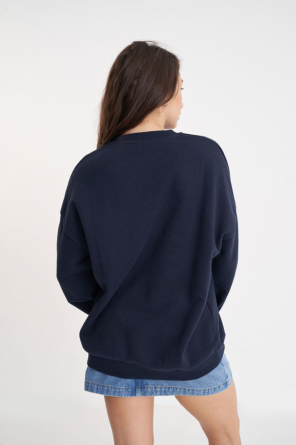 Stay warm and stylish in this classic Huffer crewneck. The midnight color provides a stylish twist, while the big Huffer H detailing adds a touch of personality. Perfect for any casual occasion. (Just don't wear it to a formal event, that's not cool.)