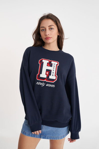 Stay warm and stylish in this classic Huffer crewneck. The midnight color provides a stylish twist, while the big Huffer H detailing adds a touch of personality. Perfect for any casual occasion. (Just don't wear it to a formal event, that's not cool.)