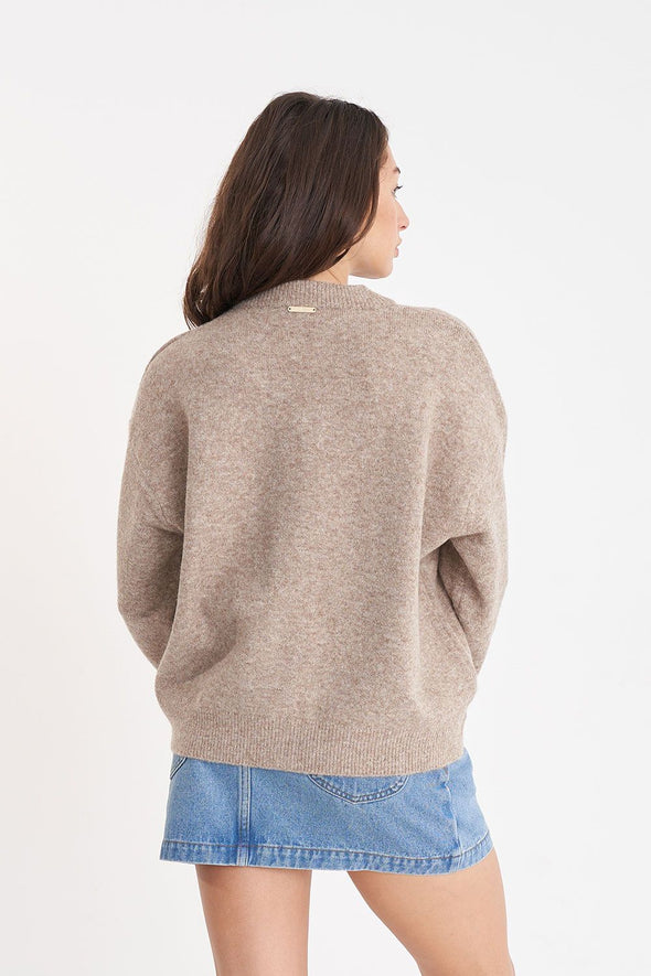 Add a touch of quirk to your wardrobe with The Kendall Cardigan. This versatile wardrobe essential is perfect for any season, thanks to its lightweight and comfortable blend. Whether you're knitting up a storm or just looking for a stylish layer, this fully fashioned knit cardigan has got you covered.