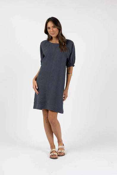 A simple go-to dress perfect for everyday. This smart shift dress drapes beautifully away from the body, making it super comfortable to wear. The soft, floaty balloon sleeves are secured with loose fitting elastic making them very comfortable and easy fitting to all arm sizes. Simple, relaxed and classy – say no more!