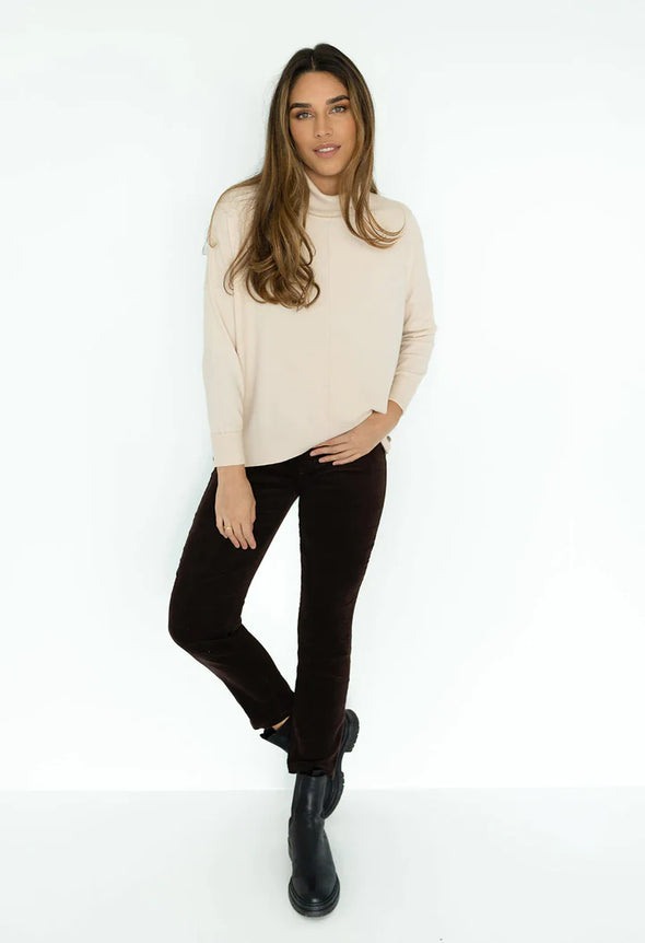 Snuggle up in Humidity's Monique super soft roll neck sweater, perfect for the cooler mornings and evening of all winter long, the roll-neck has you covered. Perfect for layering under your favourite jacket. Pair with your go-to black pants for an easy office outfit or wear with your favourite jeans for a more casual look.