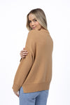 Super soft, oversized jumper.
Non-itchy wool blend.
Roomy fit that drapes away from the body.
Dropped shoulder design.
Ribbed cuffs, neck and hem.&nbsp;
Wide feature band at hem with side splits.
Available in three fab colours.
True to size. Relaxed fit throughout