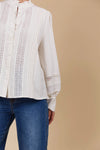 Mandarin collar
Button-down
Bishop sleeves with button cuff
Pintuck detailing
Lattice lace trim
High-low hem
Easy fit
85% Viscose, 15% Linen
Trim: 100% Polyester