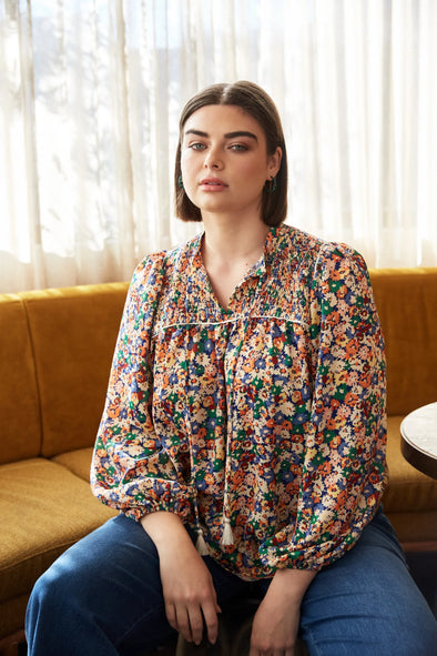 Step into winter style with the Romance Blouse. This blouse boasts understated elegance with its silk-like fabric offering a touch of luxury. Versatility is its strength - pair it casually with denim for brunch or tuck it into a maxi skirt, throw on a blazer, and conquer office chic. This blouse promises to be your winter go-to, effortlessly blending comfort and sophistication.