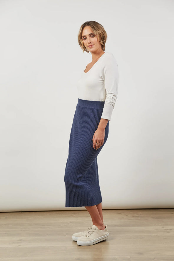 Meet your new wardrobe essential: the Skyline Knit Skirt. Effortlessly sleek and stretchy, this straight, column-style midi skirt combines comfort with style. Crafted from a super soft rib knit, it keeps you warm on date nights and brunch catch-ups while adding a touch of sophistication to your weekday wardrobe. Style it with a thick knit, boots, and a scarf for a chic finish.