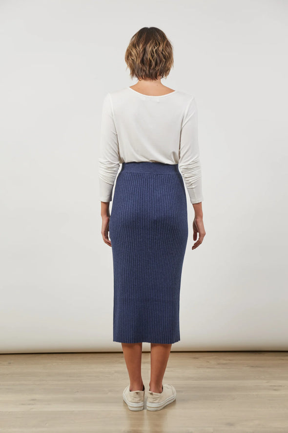 Meet your new wardrobe essential: the Skyline Knit Skirt. Effortlessly sleek and stretchy, this straight, column-style midi skirt combines comfort with style. Crafted from a super soft rib knit, it keeps you warm on date nights and brunch catch-ups while adding a touch of sophistication to your weekday wardrobe. Style it with a thick knit, boots, and a scarf for a chic finish.