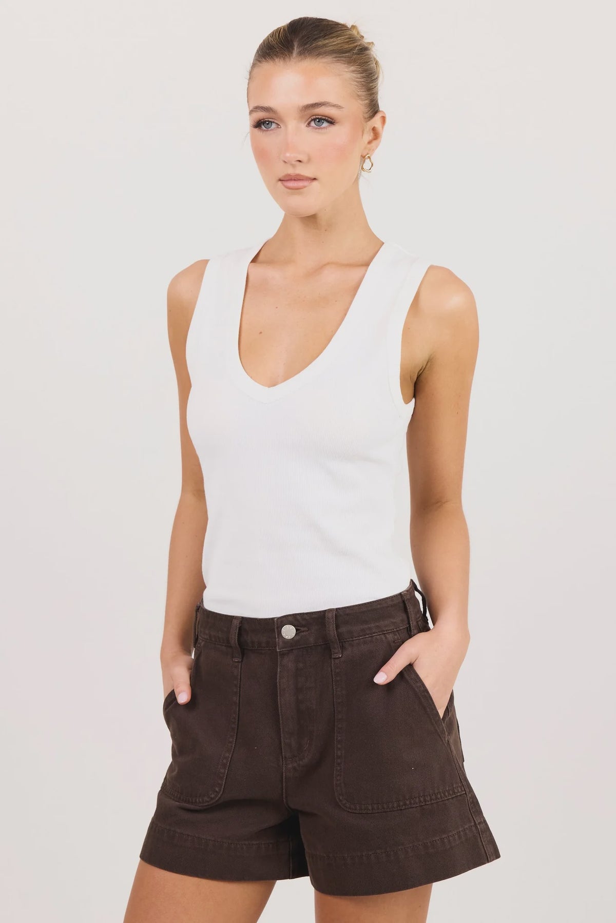 - High-rise waist
- Rigid denim
- Front patch pockets
- Belt loops
- Button and zip fastening
- Relaxed leg
- Dark chocolate wash
- Wash before wear
- Fabric Composition - 100% Cotton