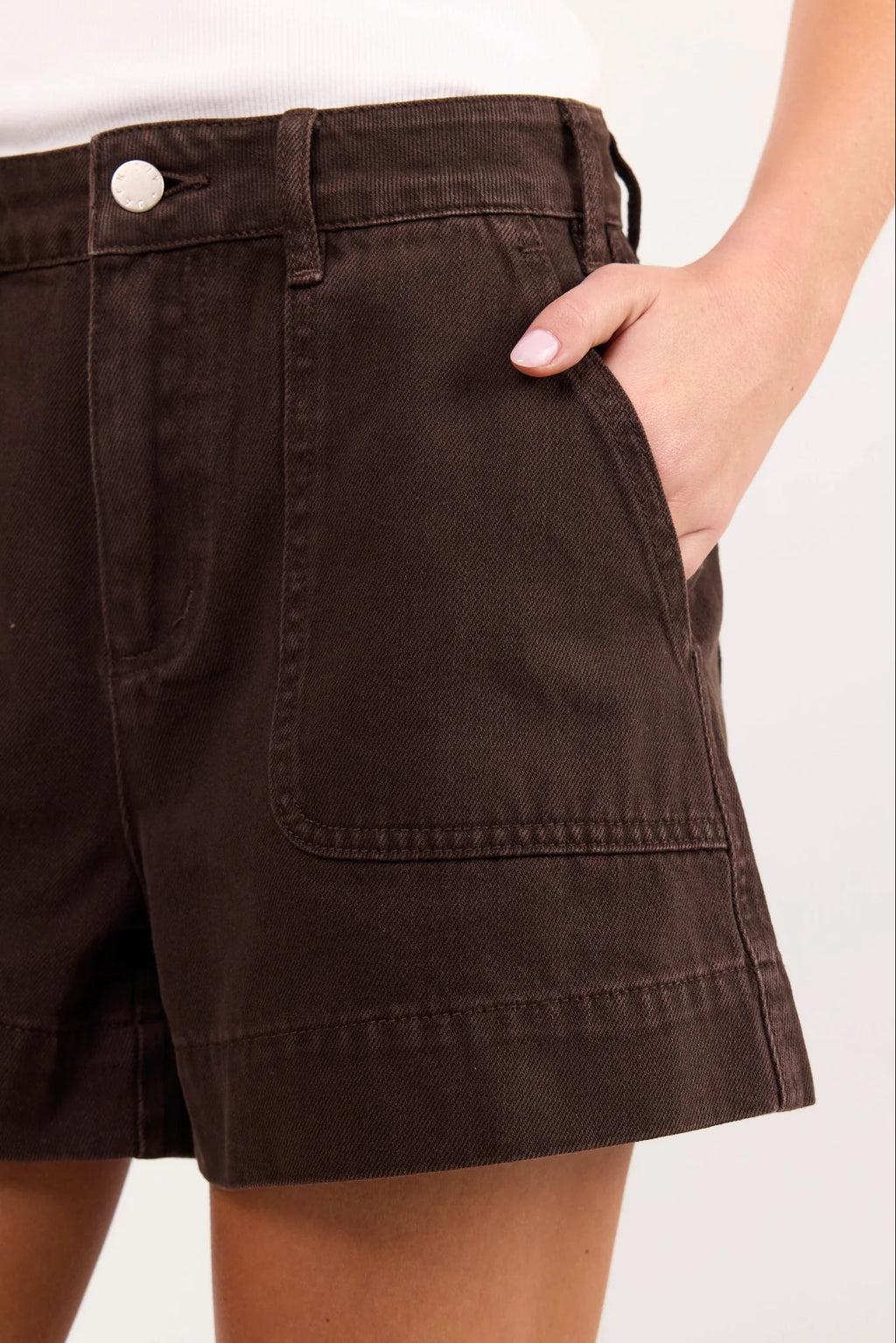 - High-rise waist
- Rigid denim
- Front patch pockets
- Belt loops
- Button and zip fastening
- Relaxed leg
- Dark chocolate wash
- Wash before wear
- Fabric Composition - 100% Cotton
