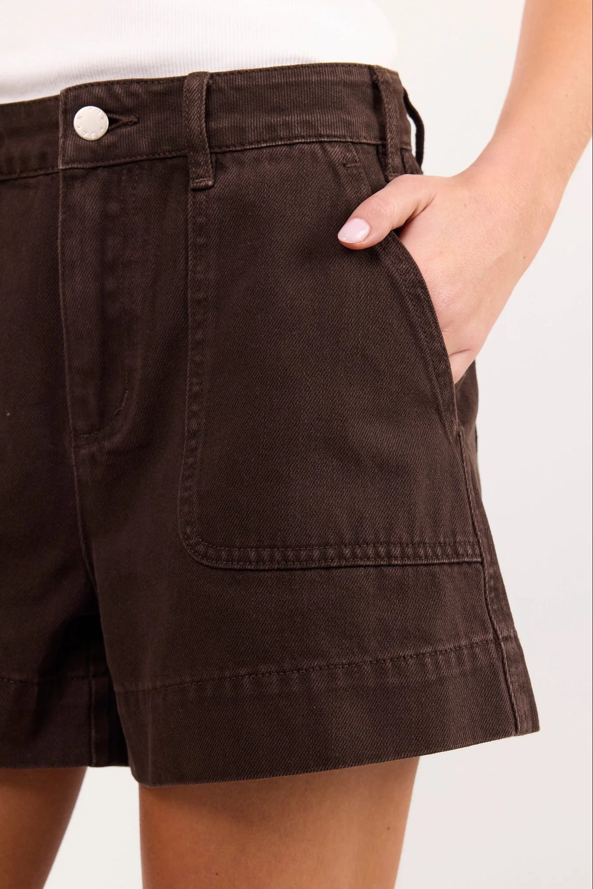 - High-rise waist
- Rigid denim
- Front patch pockets
- Belt loops
- Button and zip fastening
- Relaxed leg
- Dark chocolate wash
- Wash before wear
- Fabric Composition - 100% Cotton