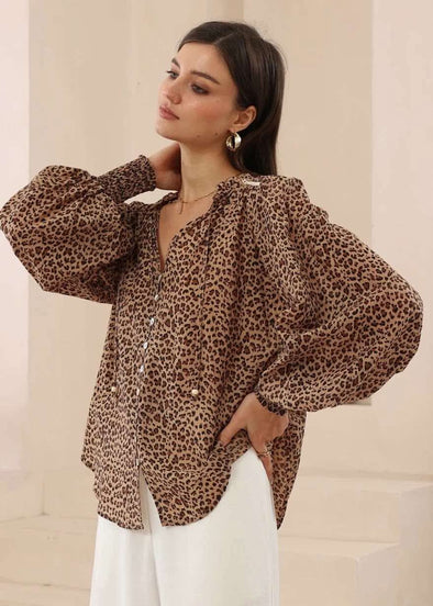 Lean into your fierce yet feminine side with The Jagger Blouse.

Designed in a classic leopard print, this statement top is made from 100% breathable cotton for all-day comfort.
