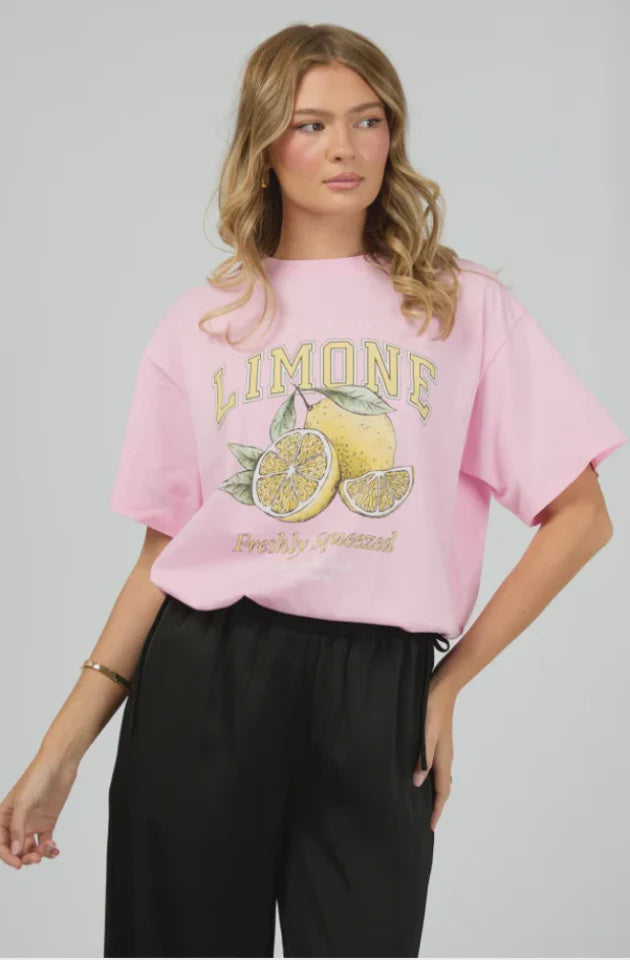 The Limone Tee sports a classic round neckline and a relaxed fit that feels like a hug from your favorite tee. Its bold, playful graphic brightens up any outfit, making it your go-to for everyday fun. Pair it with your trusty jeans or throw it under a blazer for that effortlessly cool, laid-back look. Perfectly easygoing, yet full of personality!