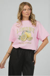 The Limone Tee sports a classic round neckline and a relaxed fit that feels like a hug from your favorite tee. Its bold, playful graphic brightens up any outfit, making it your go-to for everyday fun. Pair it with your trusty jeans or throw it under a blazer for that effortlessly cool, laid-back look. Perfectly easygoing, yet full of personality!