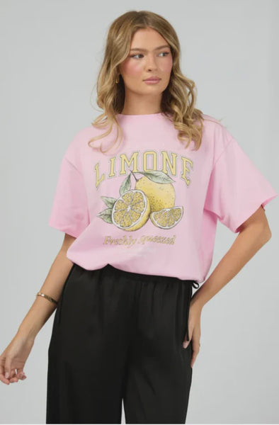 The Limone Tee sports a classic round neckline and a relaxed fit that feels like a hug from your favorite tee. Its bold, playful graphic brightens up any outfit, making it your go-to for everyday fun. Pair it with your trusty jeans or throw it under a blazer for that effortlessly cool, laid-back look. Perfectly easygoing, yet full of personality!