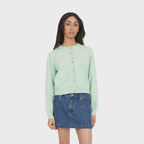 Add a splash of colour to your wardrobe with the Classic Knit Cardigan. Its relaxed fit and button-through design make layering a breeze, while soft rib trims add a subtle, flattering touch. Whether you’re teaming it with your favorite jeans or throwing it over a dress, this cardigan keeps things light and stylish all year long. Perfect for those days when you want to look polished without trying too hard!