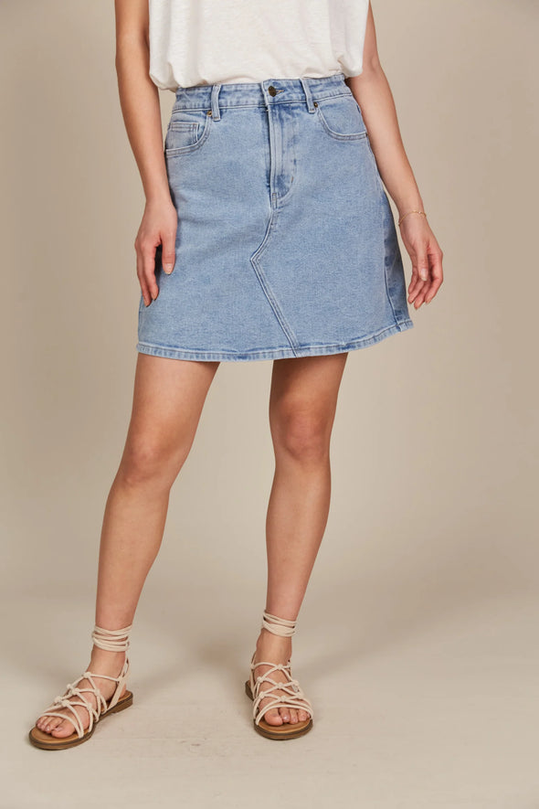 If you prefer skirts to pants, the Margot Denim Skirt is your go-to for laid-back days. This denim skirt features a mid-rise fit, button and zipper fly, and classic five-pocket styling. Falling to a comfortable mid-thigh length, it has the right amount of stretch for all-day comfort. Whether you pair it with a tank, t-shirt, button-down, or blouse, you'll always look chic and stylish!