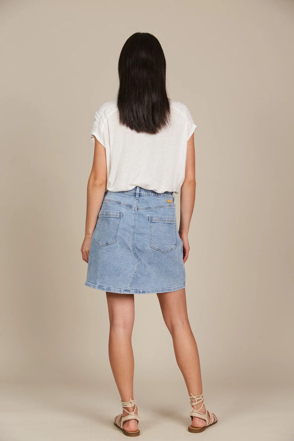 If you prefer skirts to pants, the Margot Denim Skirt is your go-to for laid-back days. This denim skirt features a mid-rise fit, button and zipper fly, and classic five-pocket styling. Falling to a comfortable mid-thigh length, it has the right amount of stretch for all-day comfort. Whether you pair it with a tank, t-shirt, button-down, or blouse, you'll always look chic and stylish!