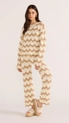 Introducing the Brooke Crochet Sweater - luxuriously soft and effortlessly chic. Its vintage-inspired zig-zag pattern and earthy tones bring a touch of '70s glamour to any outfit. With its relaxed silhouette and scalloped hem, this statement piece is perfect for both casual and coordinated looks. Embrace laid-back elegance with the Brooke Crochet Sweater.