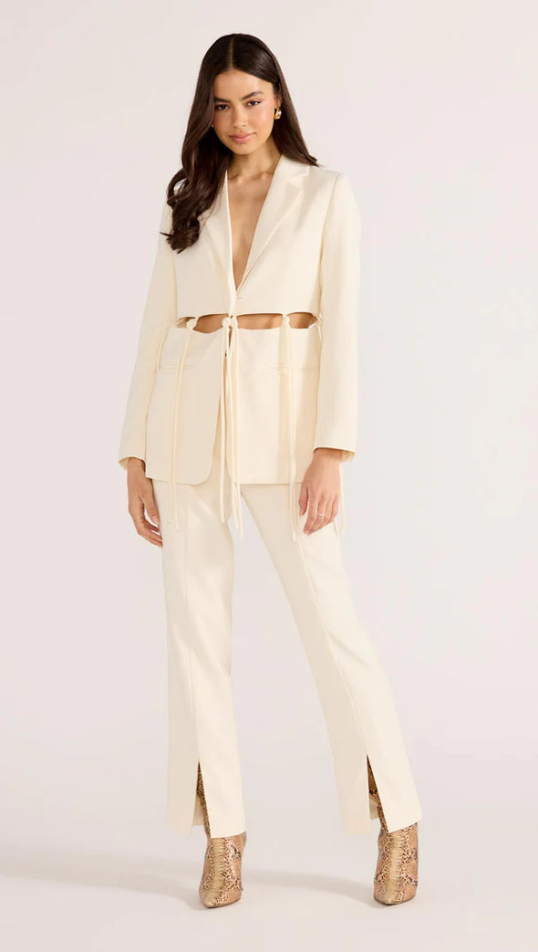 Introducing the Maeve Tie Blazer, a modern take on power dressing. With its structured tailoring and unique cut-out tie details, this blazer exudes sophistication and edge. Complete the look with the Maeve Panel Pant for a powerful suiting ensemble. Elevate your style with this exclusive piece.