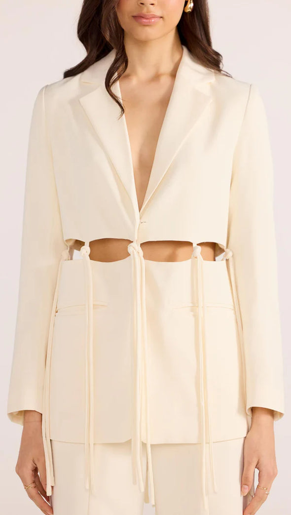 Introducing the Maeve Tie Blazer, a modern take on power dressing. With its structured tailoring and unique cut-out tie details, this blazer exudes sophistication and edge. Complete the look with the Maeve Panel Pant for a powerful suiting ensemble. Elevate your style with this exclusive piece.