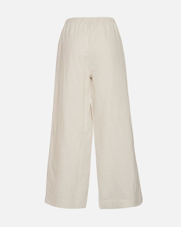 Elevate your spring and summer wardrobe with MSCH's chic and comfortable linen blend pants! The wide fit adds a casual touch, while the elastic waist with drawstring closure ensures maximum comfort. Pair with a simple tee or shirt for an effortless style. Relaxed loose style what all linen pant dreams are made of!