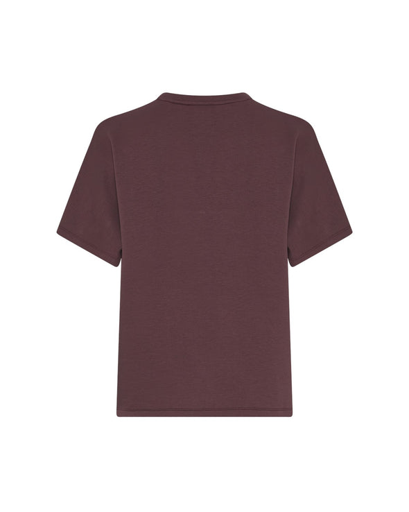 Oversized fit

Model is 179cm and wears a size S/M

5% Elastane

Soft, sustainable blend with stretch

Relaxed, oversized fit

Front pocket and wide short sleeves

Perfect for matching with the Harissa Shorts