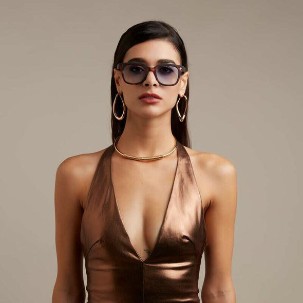 Frame colour: Havana Yellow

Lens colour: Blue Gradient

Light Filter Category 1 (43–80% transmission) — perfect for gentle sunlight

Large focal length for enhanced style and coverage