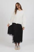 Flattering bias cut silhouette

Satin look fabric with beautiful drape

Delicate floral lace detailing

Asymmetric lace trimmed hem

Comfortable elastic waistband

Easy to dress up or down
