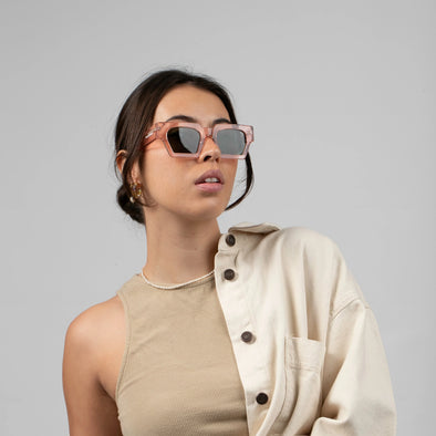 Featuring bold lines, and deep rich colorways, the captivating figure of the Parker will add a touch of sophistication to any outfit and give you that effortless appearance. Frames are pink in colour