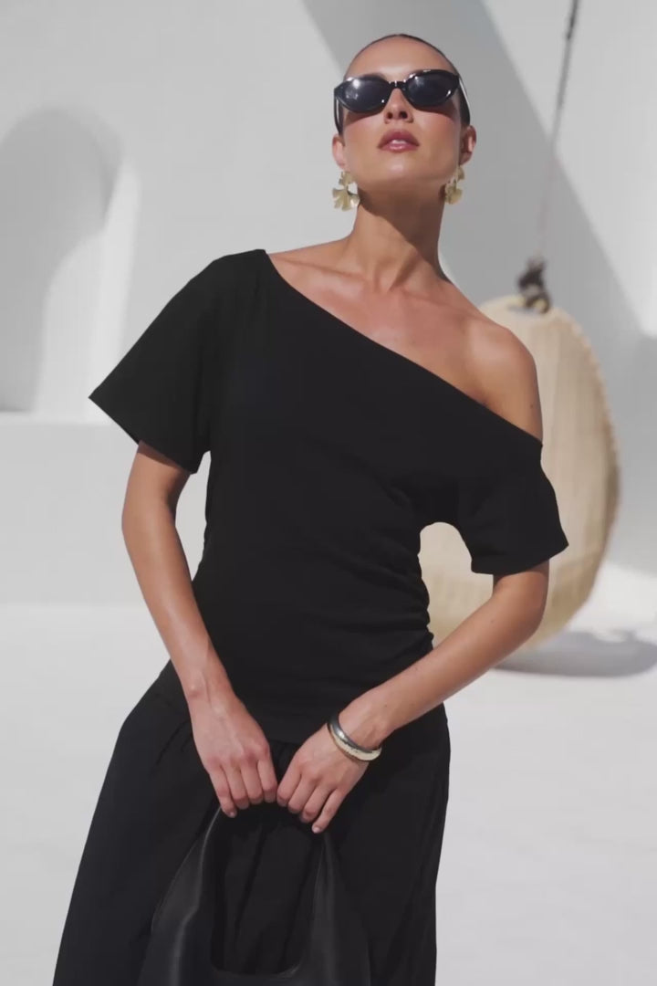 - Asymmetric off-shoulder neckline
- Short sleeves
- Fitted through the waist
- Softly gathered maxi skirt
- Pull-on design
- Natural fibre
- Fabric Composition - 100% Cotton