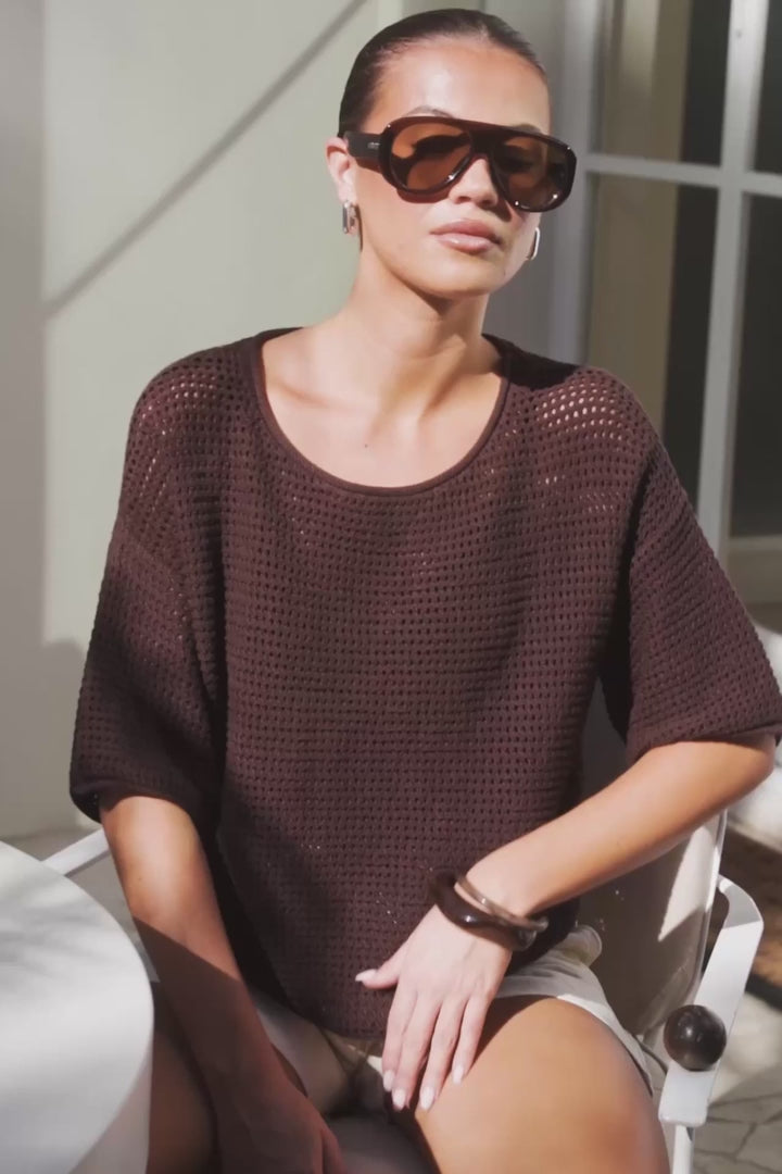 - Crew neckline
- Short sleeves
- Open crochet knit texture
- Relaxed fit
- Fabric Composition - 100% Cotton
- Natural fibre