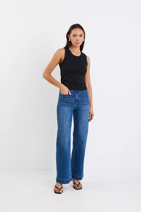 The Cobble ribbed tank is your new wardrobe MVP—soft, stretchy, and perfectly snug. Whether you pair it with flowy wide-leg pants for a chic twist or keep it cool with your favourite jeans, it adapts to every vibe. Slip it on and enjoy comfort that moves with you all day long!