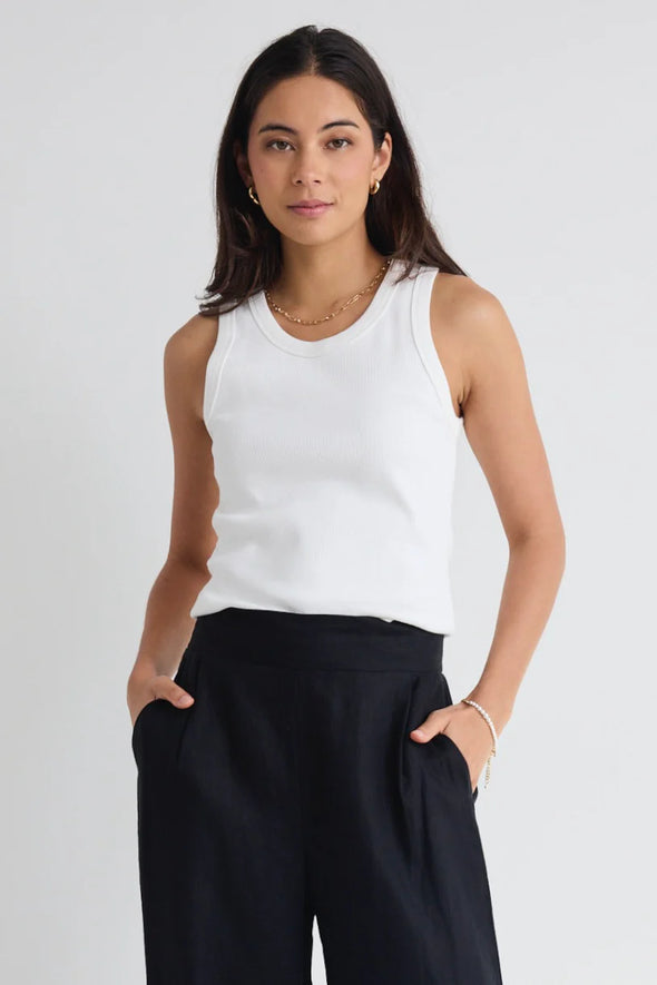 Sleeveless design for breathable comfort

Stretchy rib knit with a snug, flattering fit

95% cotton, 5% elastane for softness and stretch

Pairs effortlessly with skirts, pants, and shorts