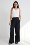 Sleeveless design for breathable comfort

Stretchy rib knit with a snug, flattering fit

95% cotton, 5% elastane for softness and stretch

Pairs effortlessly with skirts, pants, and shorts