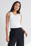 Sleeveless design for breathable comfort

Stretchy rib knit with a snug, flattering fit

95% cotton, 5% elastane for softness and stretch

Pairs effortlessly with skirts, pants, and shorts