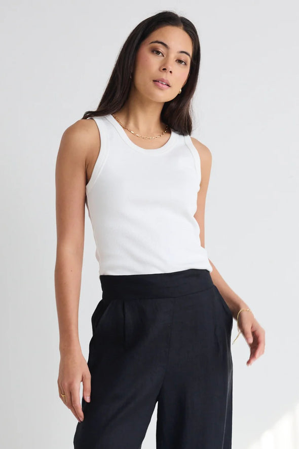 Sleeveless design for breathable comfort

Stretchy rib knit with a snug, flattering fit

95% cotton, 5% elastane for softness and stretch

Pairs effortlessly with skirts, pants, and shorts