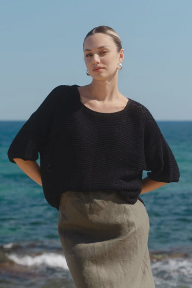 100% natural cotton for breathable comfort
- Textured open knit
- Relaxed boxy silhouette with short sleeves
- Lightweight and perfect for layering across seasons
- Natural Fibres