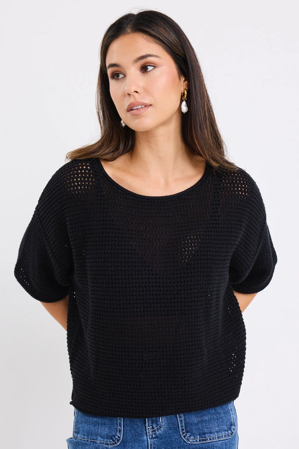 100% natural cotton for breathable comfort
- Textured open knit
- Relaxed boxy silhouette with short sleeves
- Lightweight and perfect for layering across seasons
- Natural Fibres