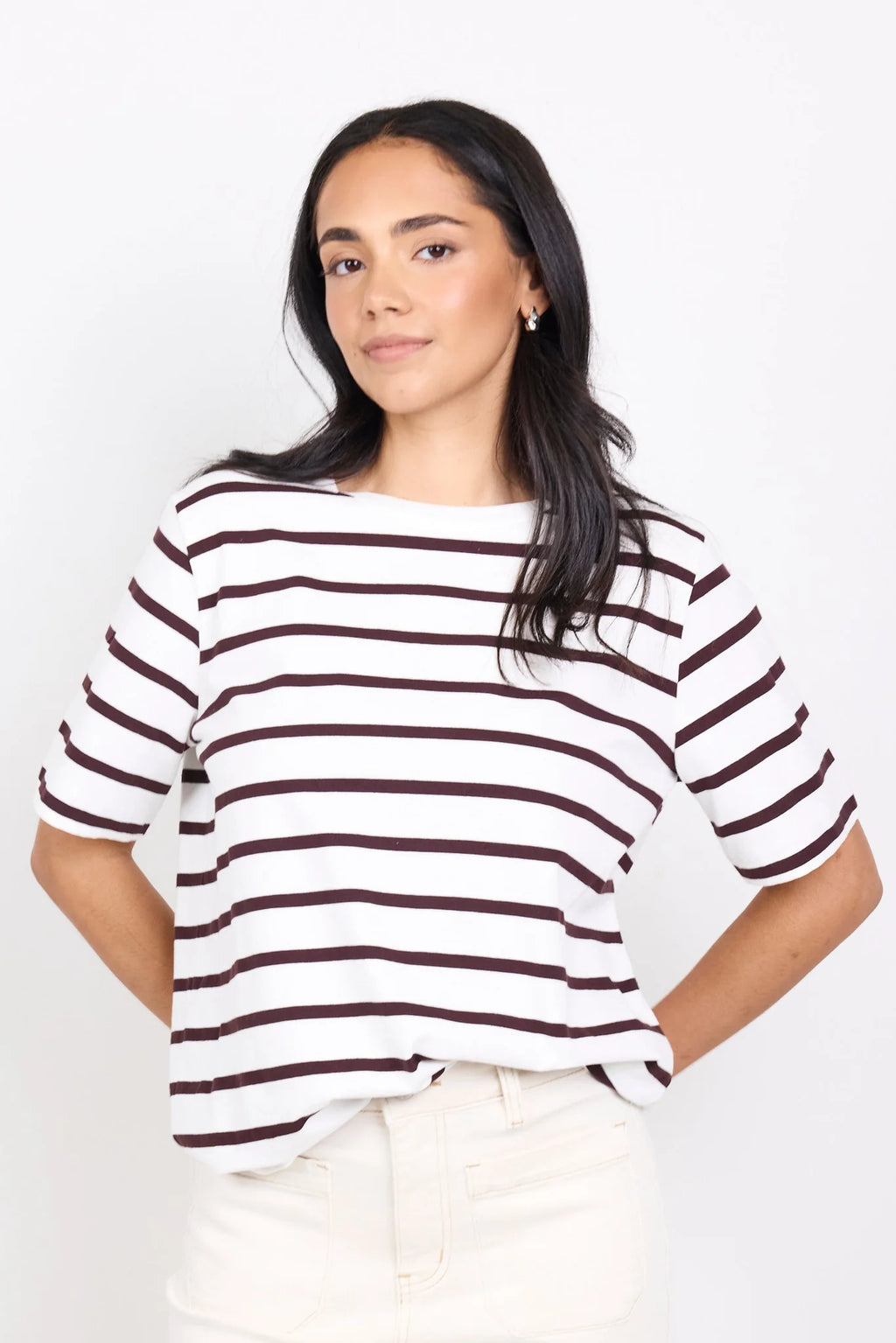 Brown and white stripe design

Oversized boxy fit for a modern silhouette

Short sleeve

Fabric Composition - 100% Cotton