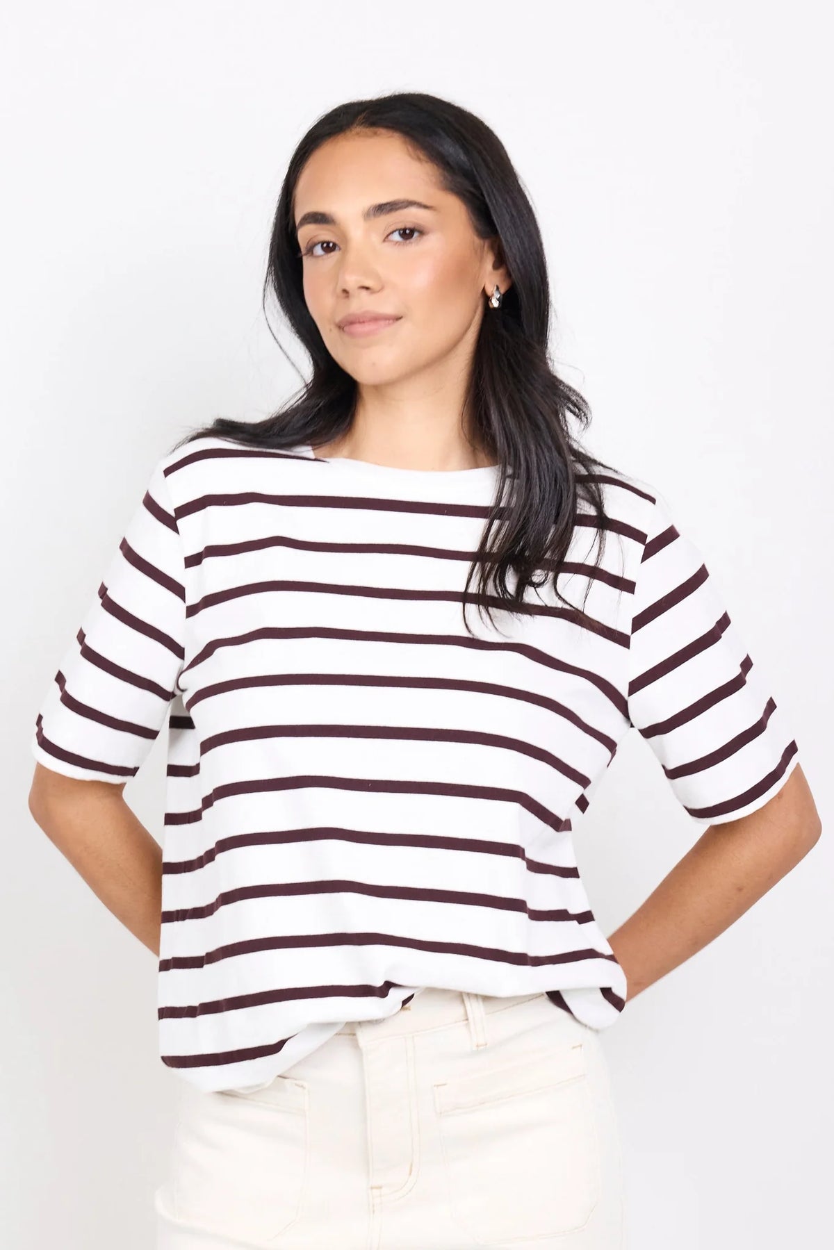 Brown and white stripe design

Oversized boxy fit for a modern silhouette

Short sleeve

Fabric Composition - 100% Cotton