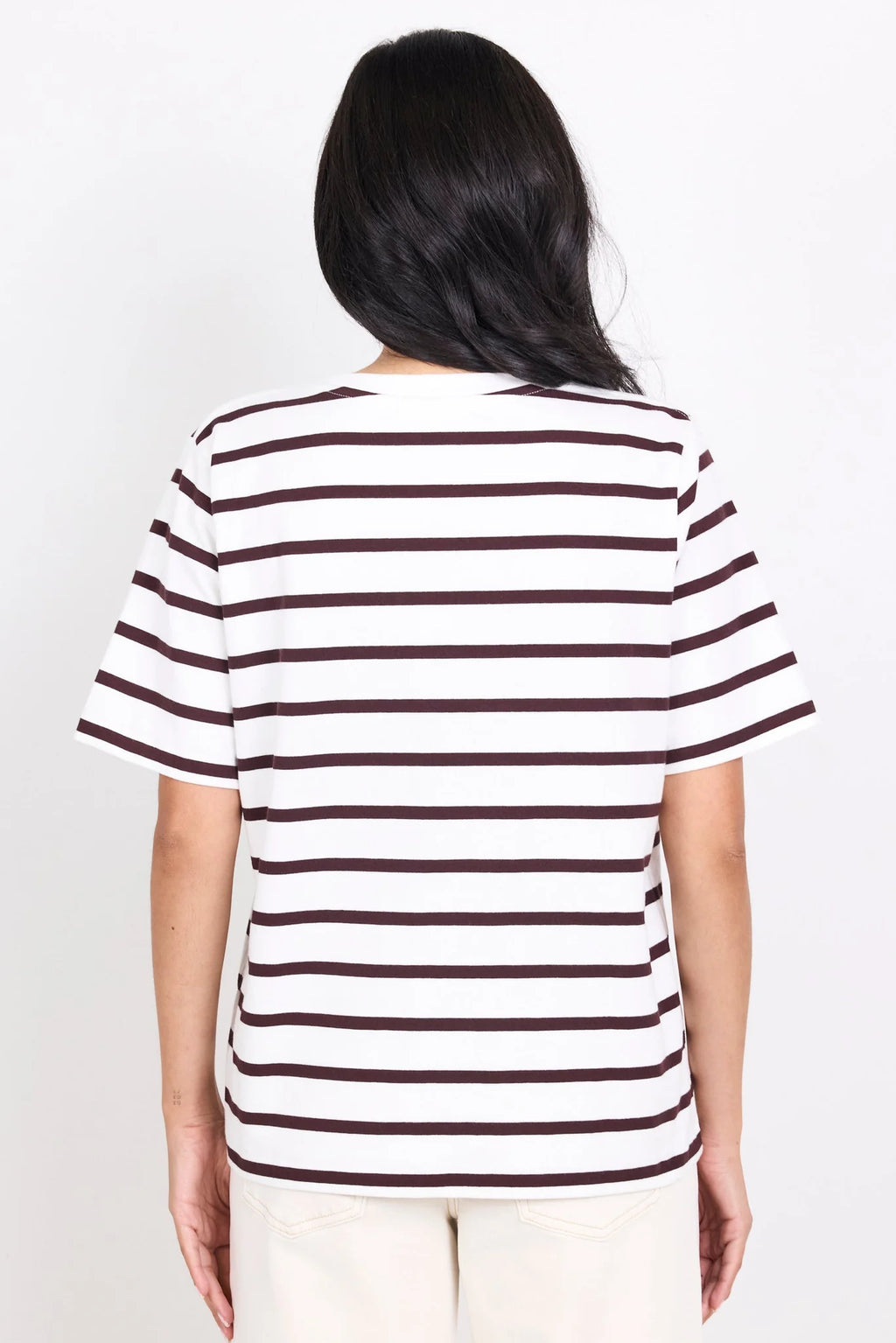 Brown and white stripe design

Oversized boxy fit for a modern silhouette

Short sleeve

Fabric Composition - 100% Cotton
