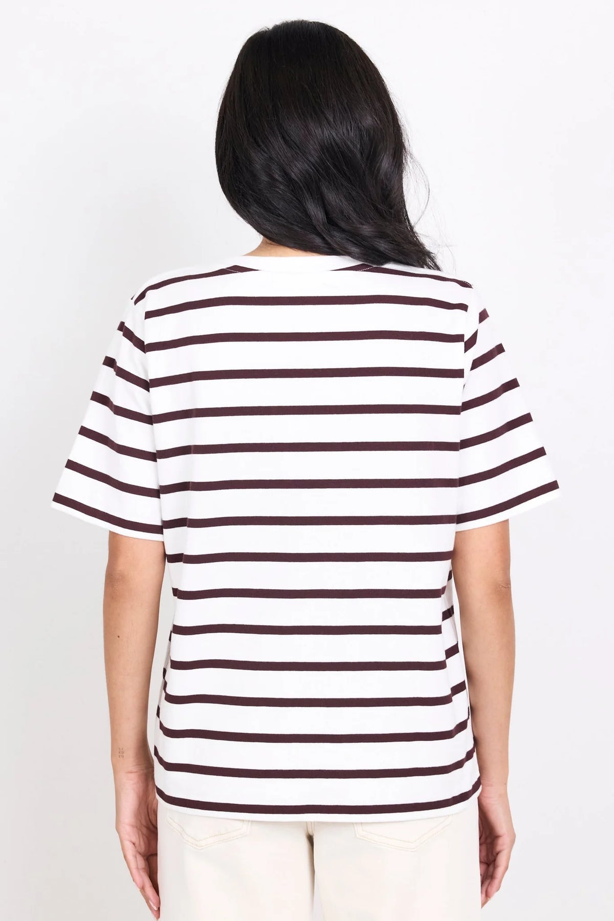 Brown and white stripe design

Oversized boxy fit for a modern silhouette

Short sleeve

Fabric Composition - 100% Cotton