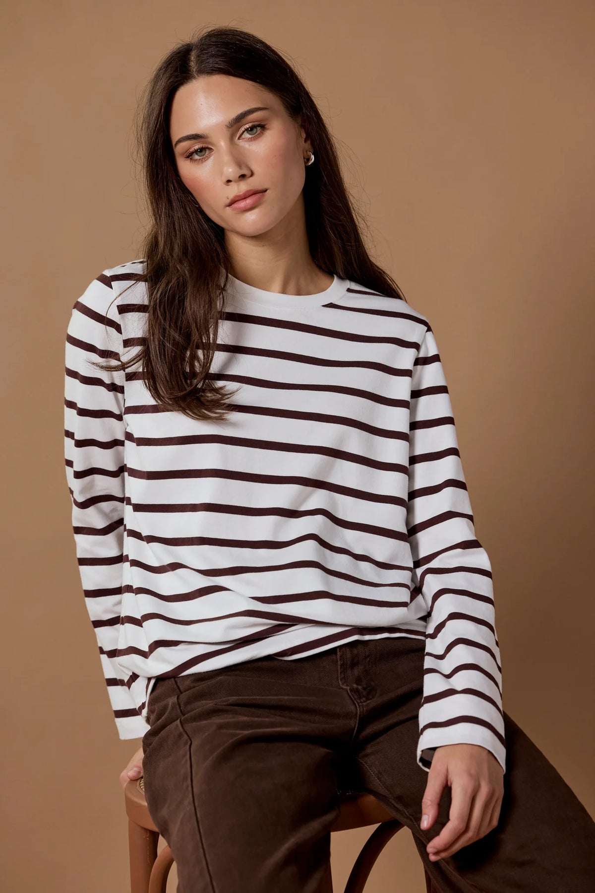 - Chocolate and white horizontal stripe
- Relaxed boxy fit with dropped shoulders
- Long sleeves with soft stretch for comfort
- Crew neckline with clean finish
- Fabric - 95% cotton, 5% elastane
- Natural fibre