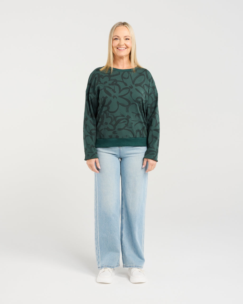 • Classic sweater silhouette with a feminine twist
• Subtle floral print for soft, elegant detail
• Comfortable and easy-to-wear everyday style
• Perfect for layering through the cooler seasons
• Effortless piece for relaxed yet polished outfits
• Fabric: 92% Cotton, 8% Spandex
