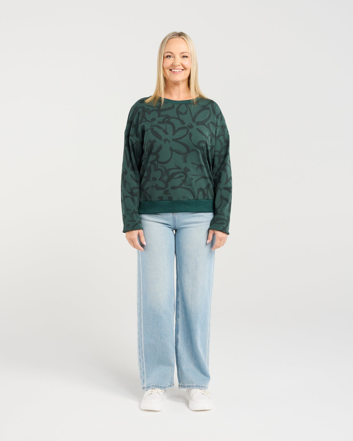 • Classic sweater silhouette with a feminine twist
• Subtle floral print for soft, elegant detail
• Comfortable and easy-to-wear everyday style
• Perfect for layering through the cooler seasons
• Effortless piece for relaxed yet polished outfits
• Fabric: 92% Cotton, 8% Spandex