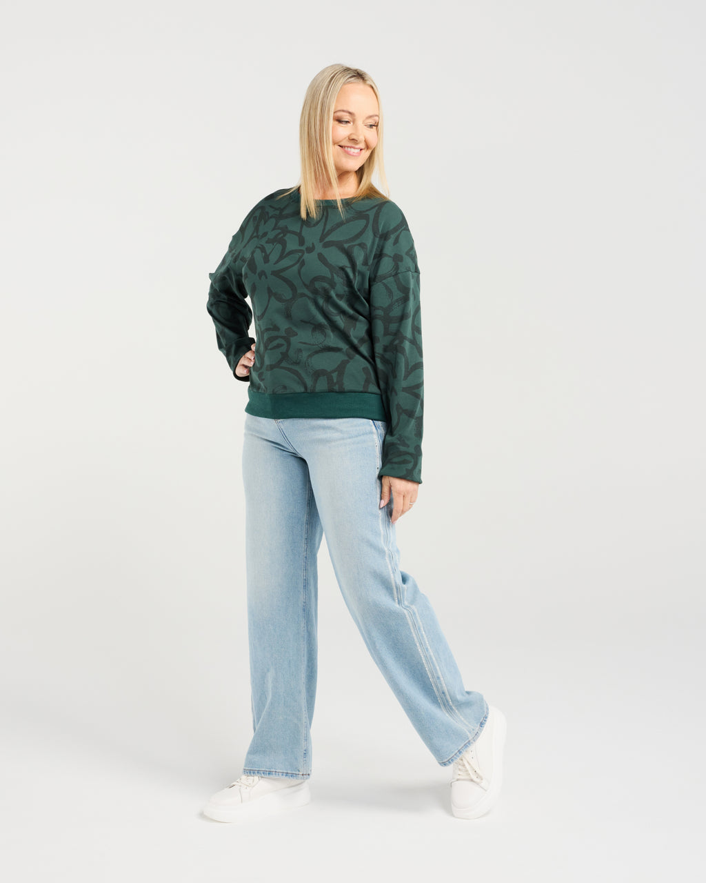 • Classic sweater silhouette with a feminine twist
• Subtle floral print for soft, elegant detail
• Comfortable and easy-to-wear everyday style
• Perfect for layering through the cooler seasons
• Effortless piece for relaxed yet polished outfits
• Fabric: 92% Cotton, 8% Spandex