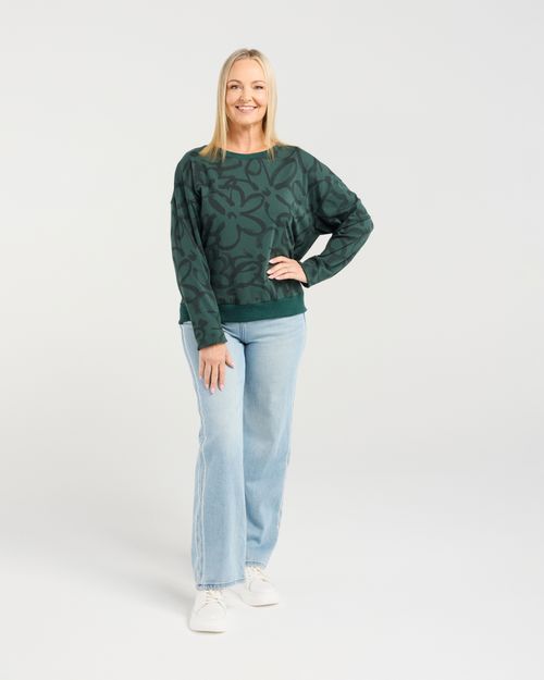• Classic sweater silhouette with a feminine twist
• Subtle floral print for soft, elegant detail
• Comfortable and easy-to-wear everyday style
• Perfect for layering through the cooler seasons
• Effortless piece for relaxed yet polished outfits
• Fabric: 92% Cotton, 8% Spandex