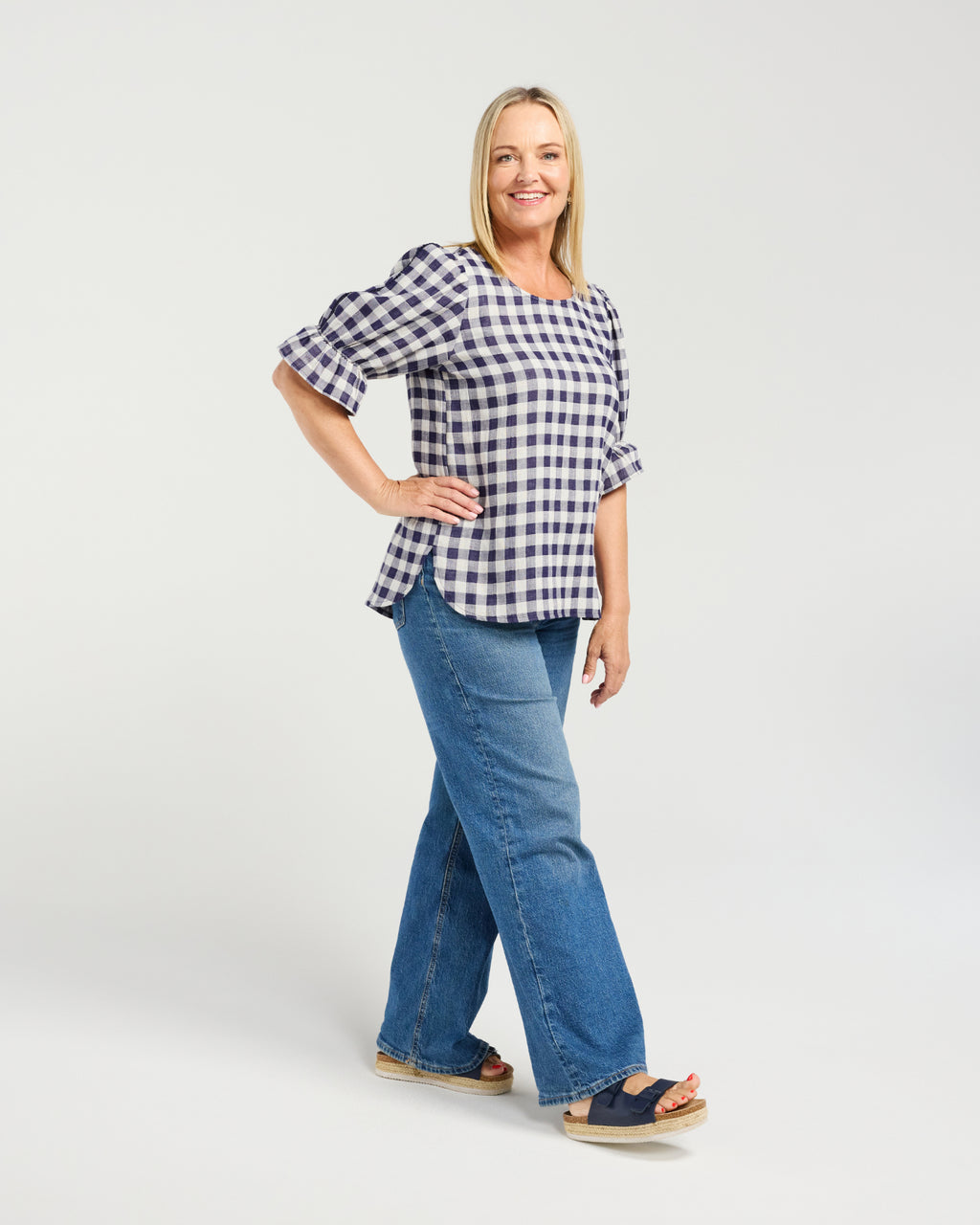 Classic check print
Flattering longline silhouette
Side shaping for a feminine fit
Elasticated sleeves
70% Cotton, 30% Linen