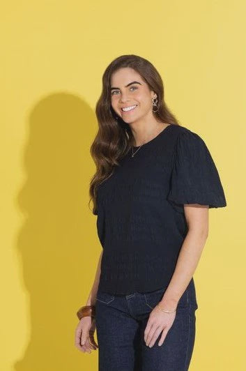 Stand out in the crowd with this beautiful top&nbsp;from Seeking Lola.

This is a wardrobe MUST have, this season.&nbsp; It oozes femininity thanks to the versatile colour and it's shapely cut which is exaggerated by the puff 1/2 sleeve and the textural quality of the fabric.